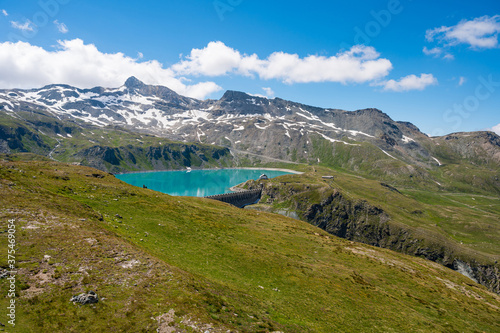 Artificial lake for hydroelectric power plant surrounded with mountains. © anzebizjan
