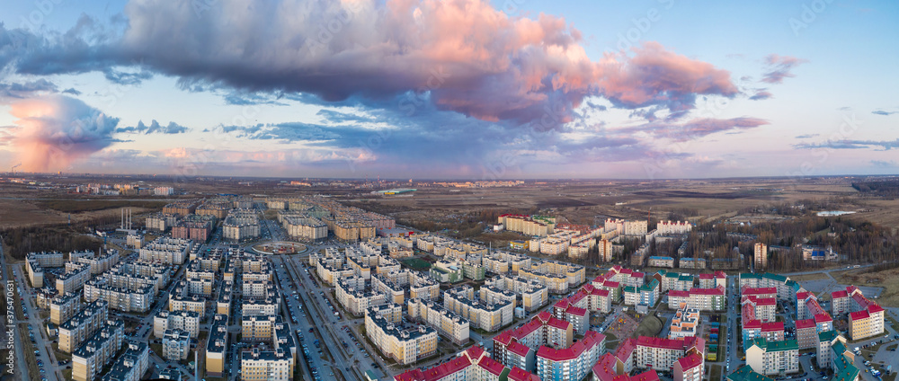 Panoramic aerial view of the microdistrict of the city of St. Petersburg in the evening