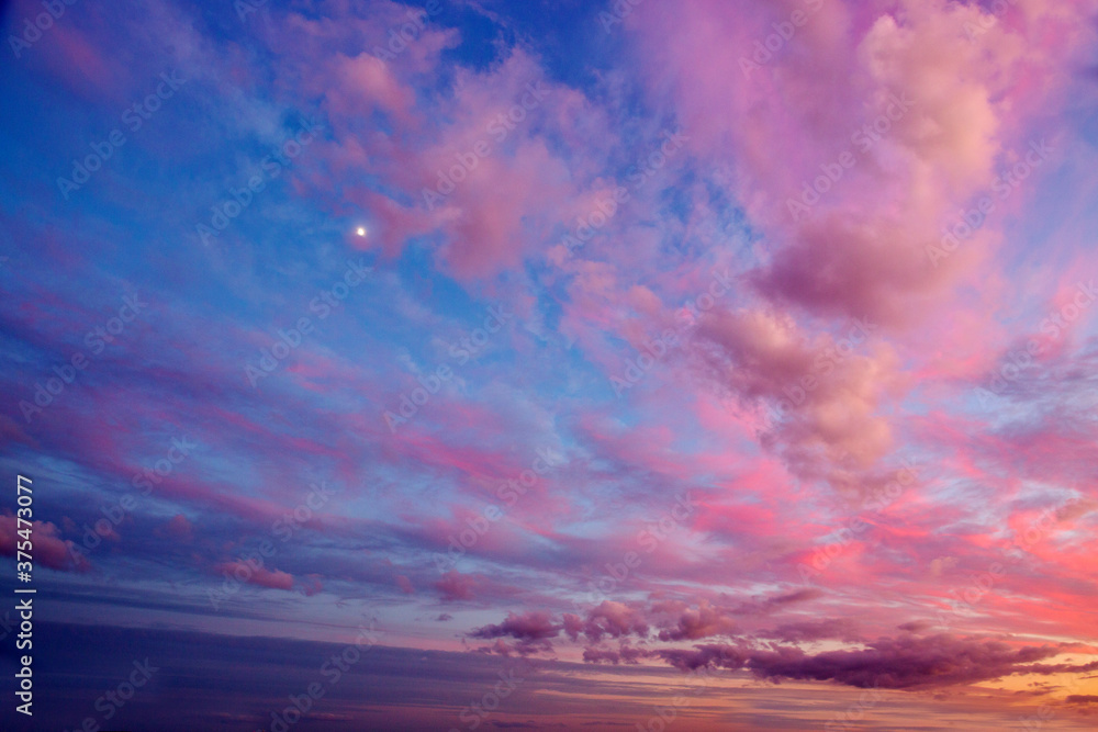 Obraz premium Beautiful sunset clouds background,dramatic cloud and colorful sky