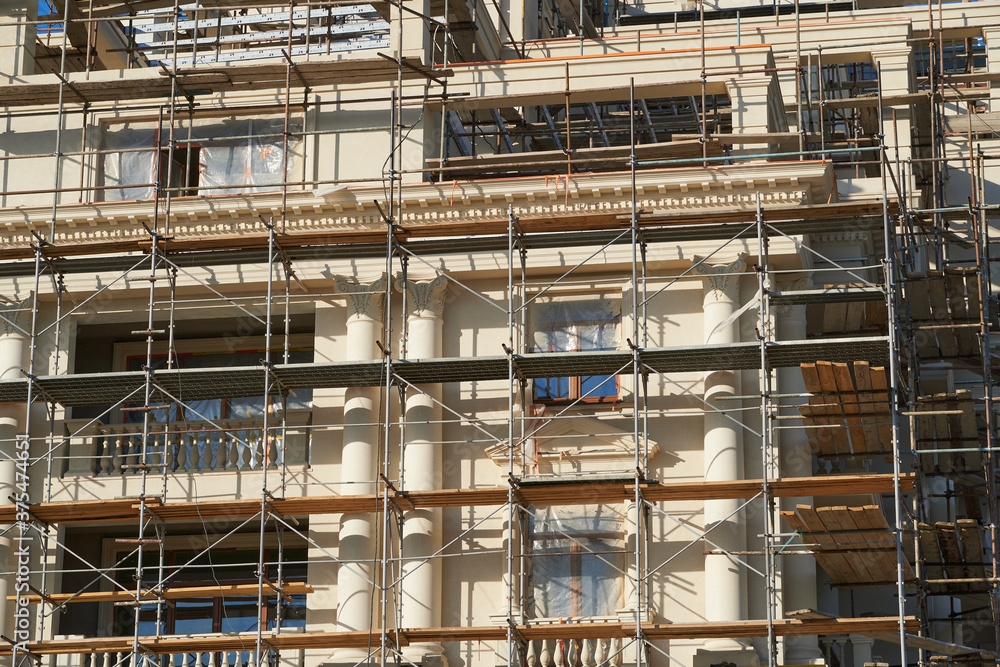 scaffolding and new building as background