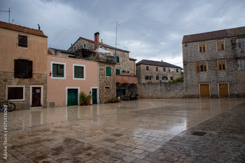 Stari Grad/Croatia-August 7th,2020: Empty square of the oldest town on the Hvar island during heavy summer rain