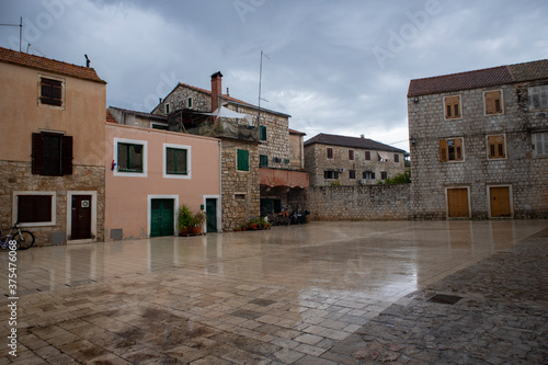Stari Grad/Croatia-August 7th,2020: Empty square of the oldest town on the Hvar island during heavy summer rain