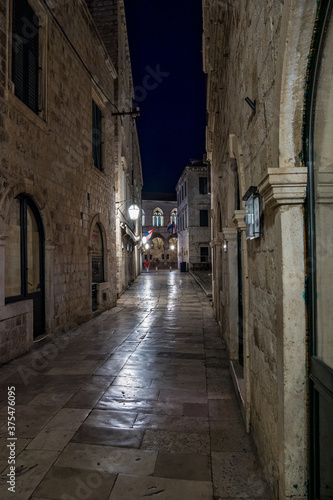 Fototapeta Naklejka Na Ścianę i Meble -  Old City of Dubrovnik. Narrow street of medieval town at night, Dalmatia Croatia