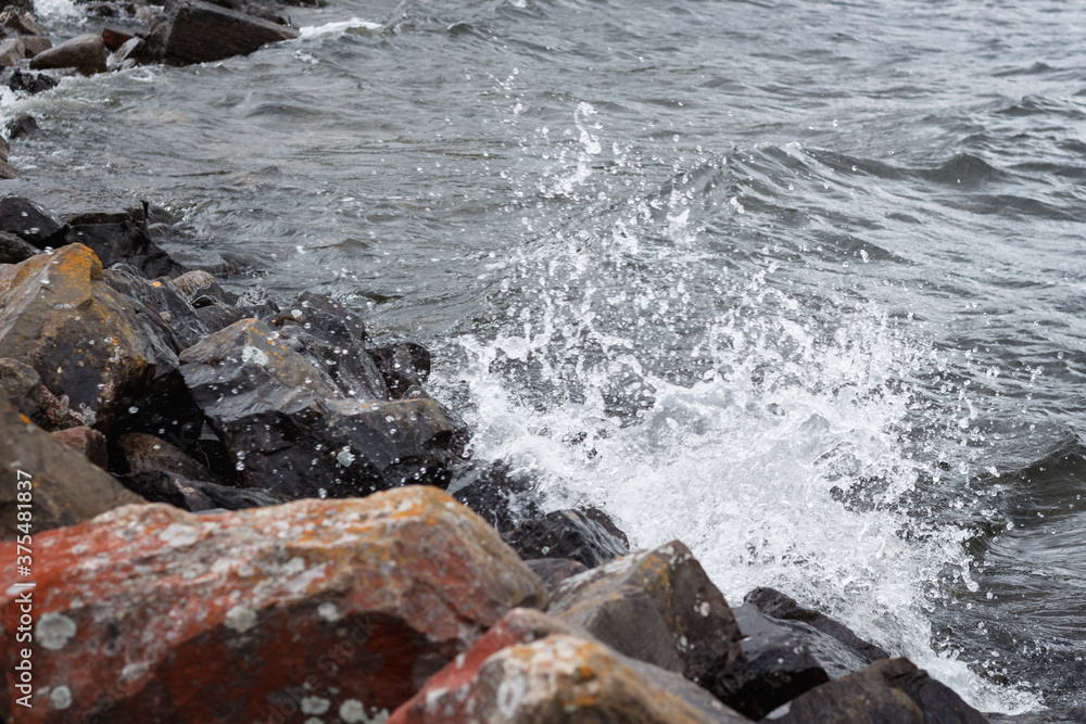 Wind-blown waves on the shore of Lake Storsjön Wind-blown waves on the shore of Lake Storsjön