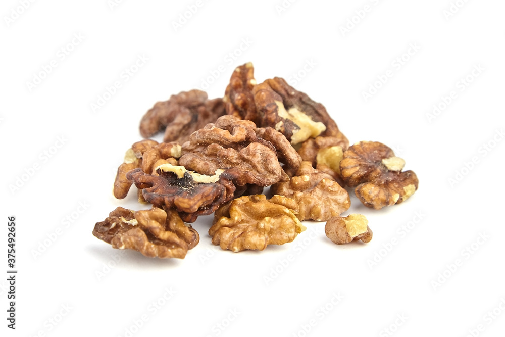 Walnut kernels isolated on white background Walnut kernels isolated on white background
