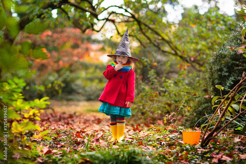 Kids trick or treat on Halloween night. Kids trick or treat on Halloween night.