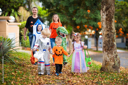 Kids trick or treat. Halloween fun for children.