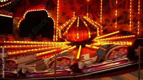 Close up of amusement park ride spinning rapidly. photo