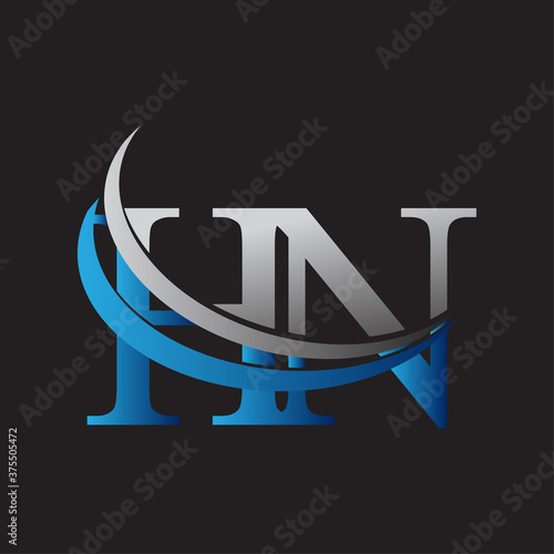 initial letter HN logotype company name colored blue and grey swoosh design. vector logo for business and company identity.