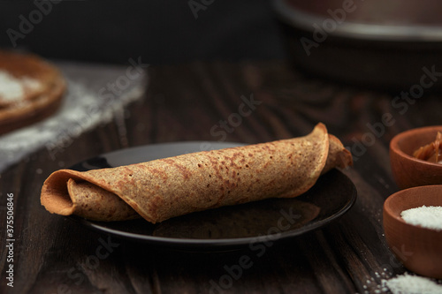 gastronomic photography, pancakes on dark background