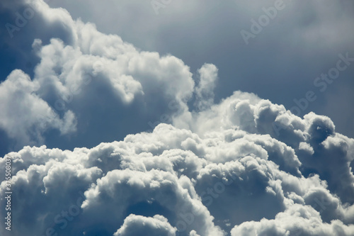 Moment of cloud over sky, on cloudy day.