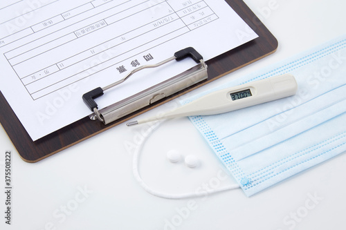 Wallpaper Mural メディカルイメージ素材---問診票　温度計 Torontodigital.ca