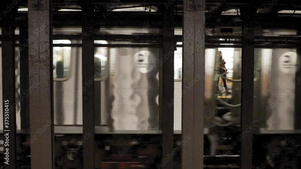 New York Subway USA. Detail of Train Moving on Track at Station Platform New York Subway USA. Detail of Train Moving on Track at Station Platform
