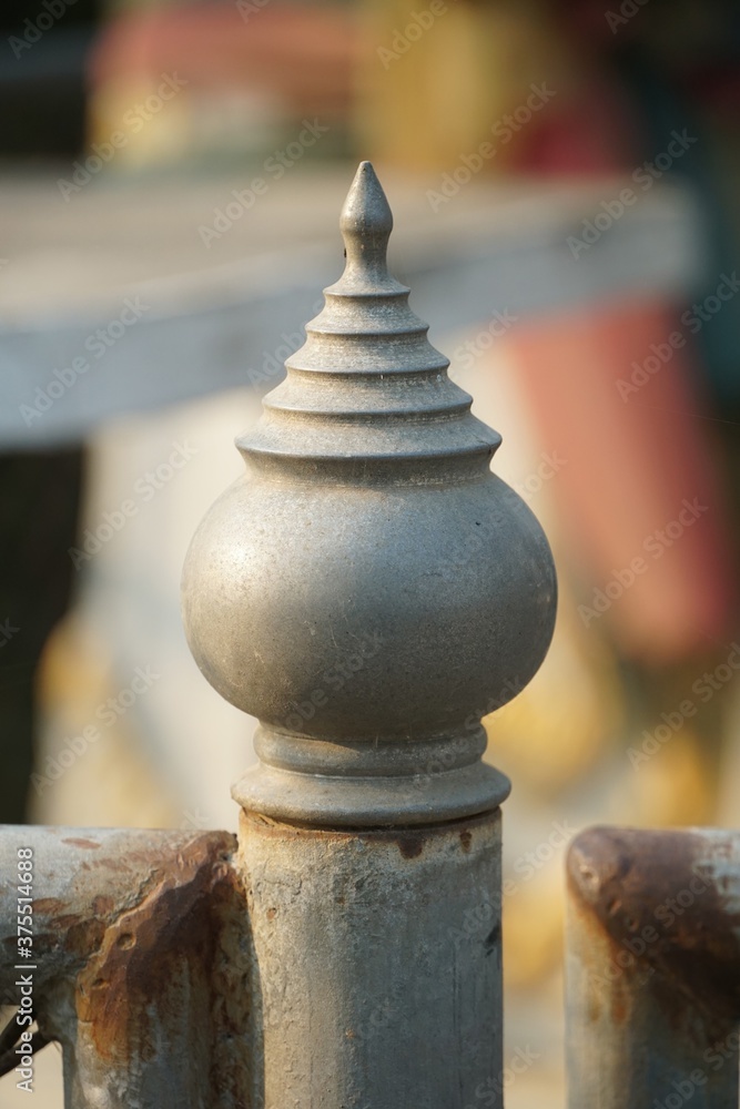 close up iron lotus shape on metal cage