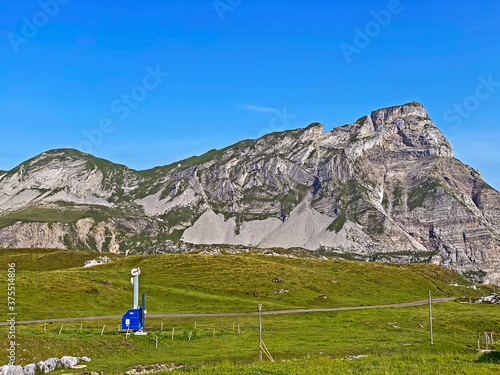 Alpine peaks Chli Haupt Murmelchopf and Haupt or Brünighaupt (Bruenighaupt oder Brunighaupt) in the Uri Alps mountain massif, Melchtal - Canton of Obwald, Switzerland (Kanton Obwalden, Schweiz) photo