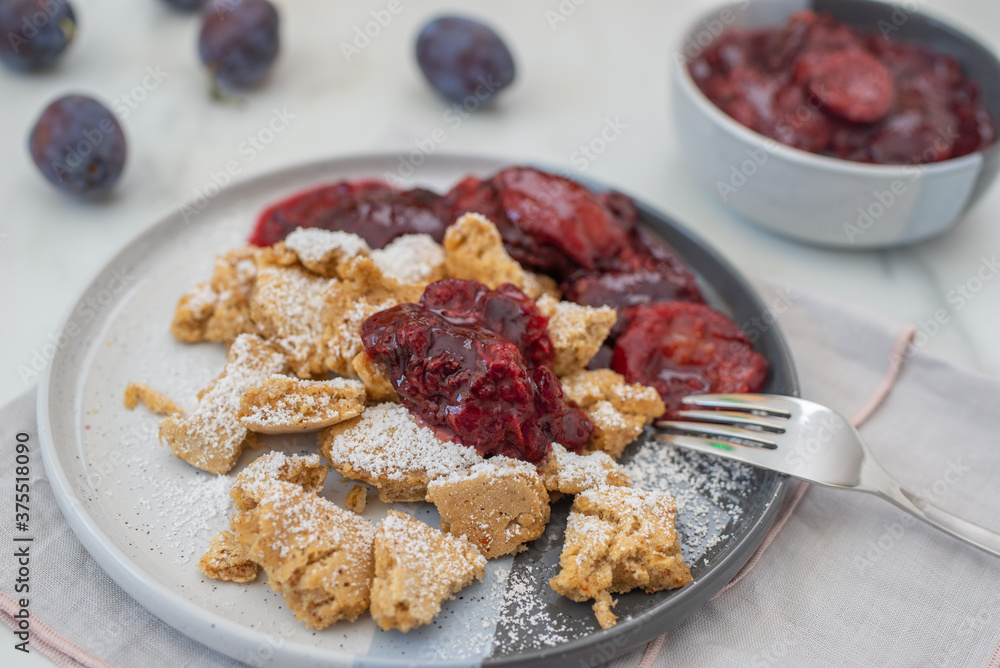Kaiserschmarrn is a traditional Austrian or German sweet pancake dessert Kaiserschmarrn is a traditional Austrian or German sweet pancake dessert