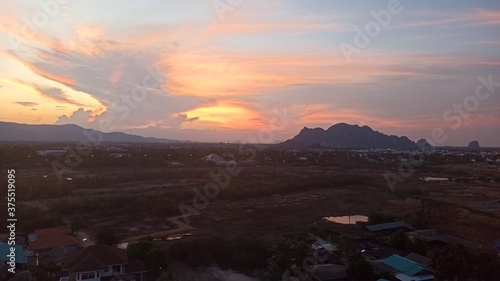 sunset over the mountains and beach