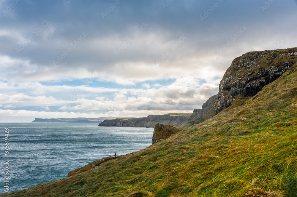 Scenic view over coastline and sea in the Northern Ireland in winter. Concepts: landscape, outdoor, tourism, travel