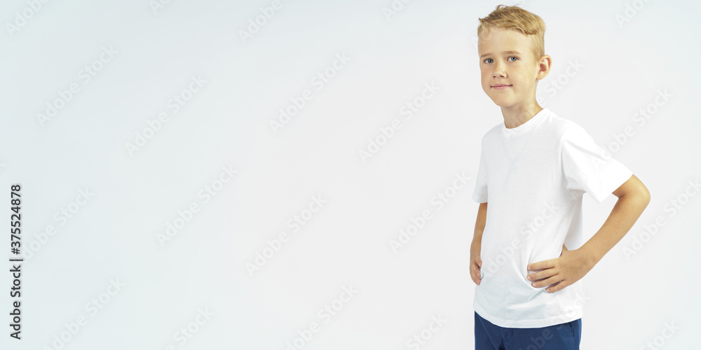 Portrait of a schoolboy looking at the camera. Isolated background. Portrait of a schoolboy looking at the camera. Isolated background.