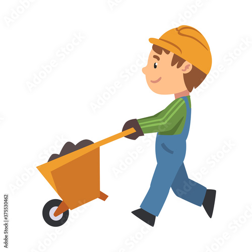Boy Construction Worker with Wheelbarrow, Cute Little Builder Character Wearing Blue Overalls and Hard Hat with Construction Equipment Cartoon Style Vector Illustration