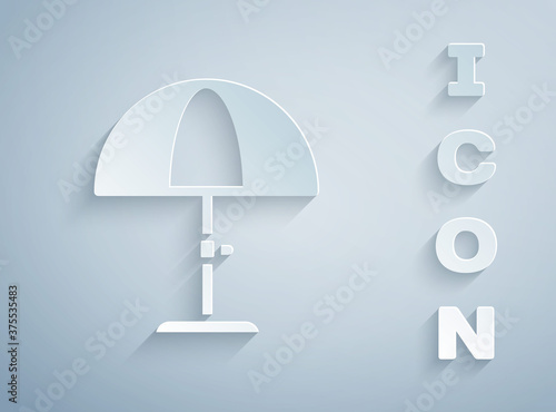 Paper cut Sun protective umbrella for beach icon isolated on grey background. Large parasol for outdoor space. Beach umbrella. Paper art style. Vector.