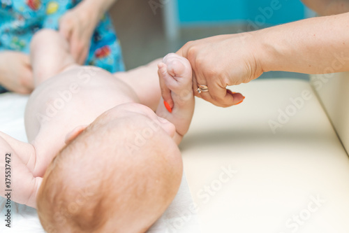 Baby massage, close up shot. Child massage, newborn.