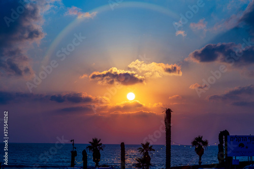 Beautiful summer sunset on the Mediterranean Sea. Israel. August. Abnormal heat