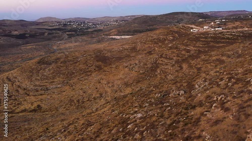 Aerial landscape view over mountains of judea and samaria village, Mateh Binyamin Regional Council, Israel. Birds eye view of Jerusalem mountains in a jurisdiction settlement occupation land photo