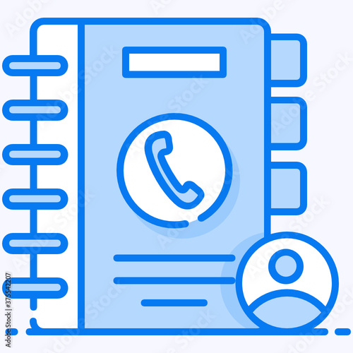 
Receiver on spiral jotter showing concept of address book icon

