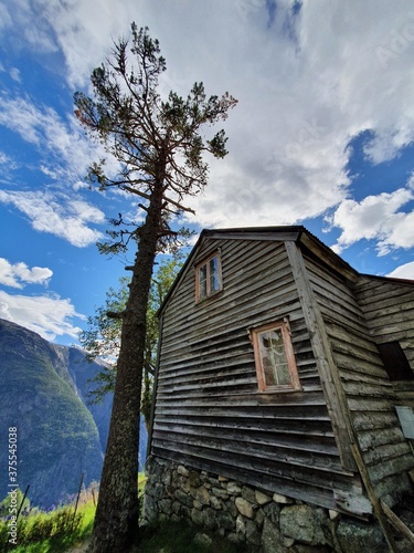 Old wooden house on a background of blue sky - Kjeåsen 