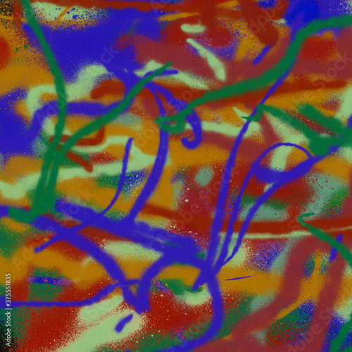 Colorful spray paint ink texture. Graffiti painting on the wall. Street art and vandalism. Digitally airbrushed paper background. 