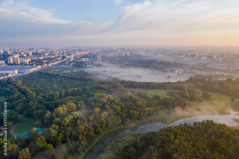 Photo from a height Foggy morning in Minsk from a drone. Loshitsa Park!