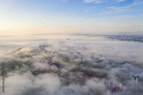 Light fog over the Minsk area! High-rise building and a line through the fog!