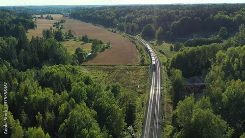 The high-speed intercity train moves on the railroad in the countryside in Espoo, Finland.