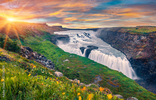 Wonderful summer view of popular tourist destination - Gullfoss waterfall. Spectacular sunrise on Hvita river. Gorgeous morning scene of Iceland, Europe. Traveling concept background.