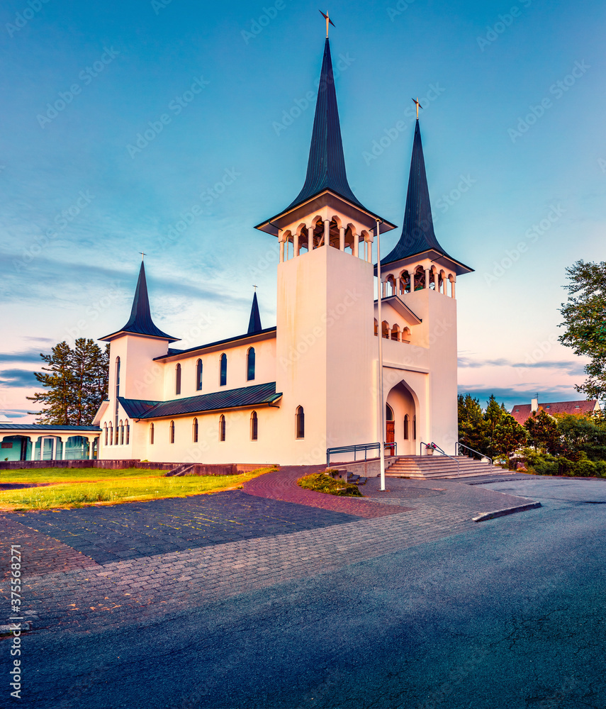 Early morning view of Hateigskirkja church. Colorful summer cityscape of Reykjavik. Splendid outdoor scene of Iceland, Europe. Architecture traveling background..