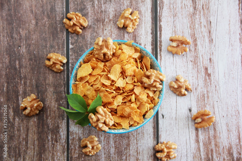dry Breakfast muesli and walnuts in a decorative plate dry Breakfast muesli and walnuts in a decorative plate