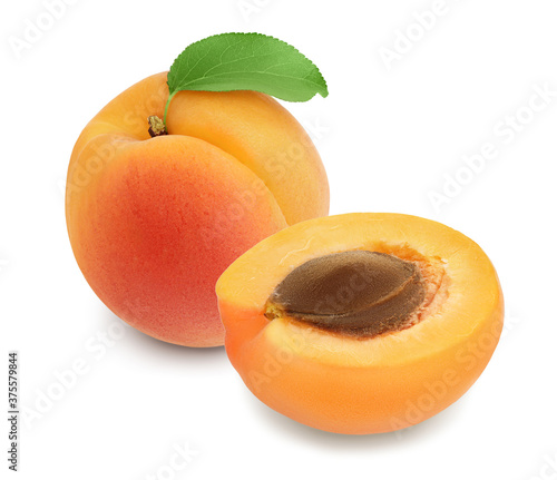 apricot fruit with half isolated on white background. Clipping path and full depth of field