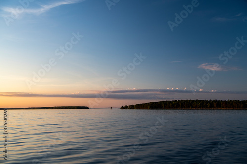 sunset on a large lake from the ship