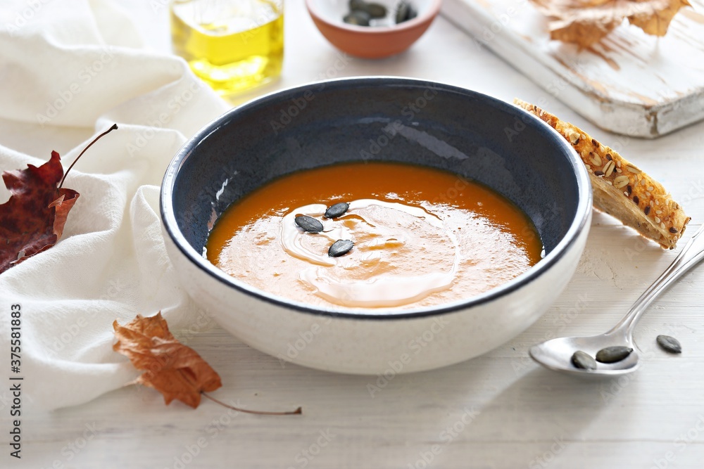 Pumpkin soup with pumpkin seeds. Selective focus Pumpkin soup with pumpkin seeds. Selective focus