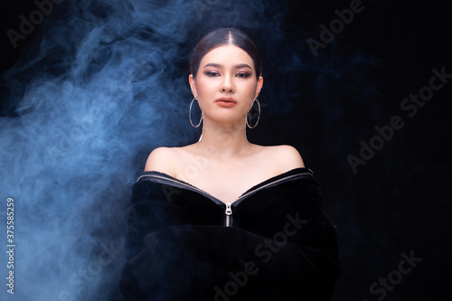 20 Asian Woman in High Fashion style over smoke fog background