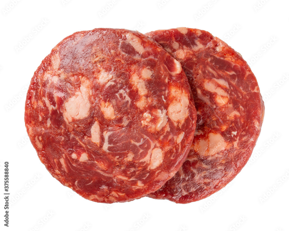 Two raw cutlet of minced beef meat for burger isolated on white background. Top view. Two raw cutlet of minced beef meat for burger isolated on white background. Top view.