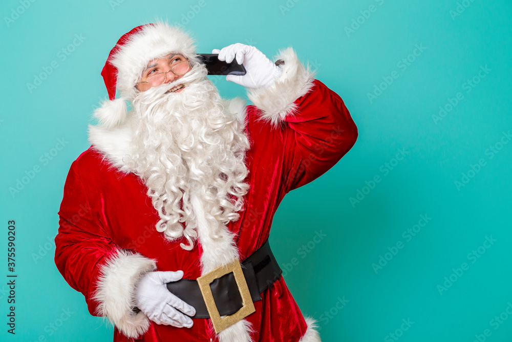 Santa Claus having a phone conversation Santa Claus having a phone conversation