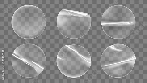 Transparent round adhesive stickers mock up set isolated on transparent background. Plastic crumpled round sticky label with glued effect. Template of a label or price tags. 3d realistic vector mockup