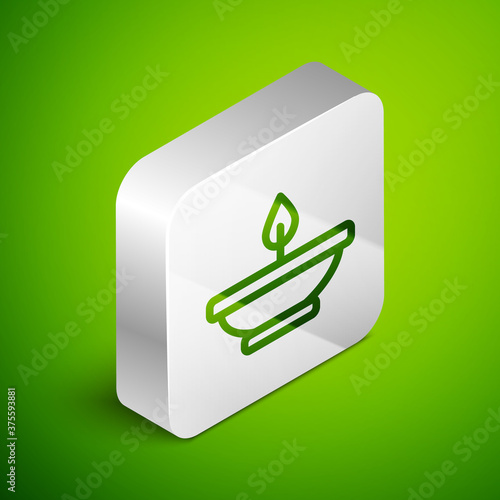 Isometric line Aroma lamp icon isolated on green background. Silver square button. Vector.