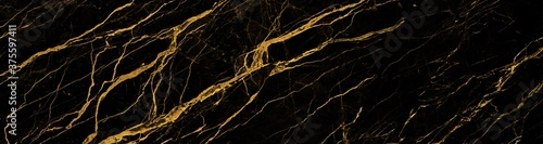 black marble background with yellow veins © Obsessively