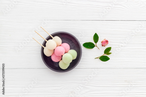 Asian cooking background - traditional sweets Dango, dumpling rice cake