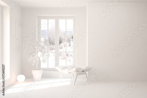 White stylish minimalist room with armchair and winter landscape in window. Scandinavian interior design. 3D illustration © AntonSh
