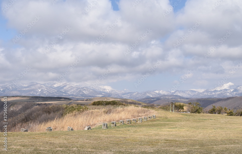 The peaceful landscape of the Hokkaido mountain range in Japan