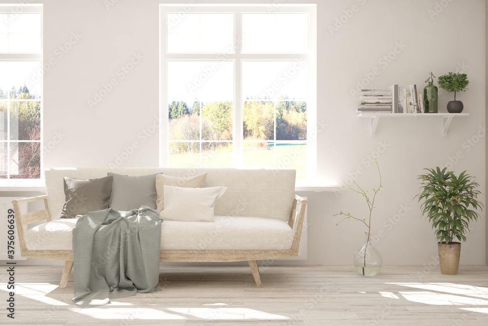 White stylish minimalist room with sofa and autumn landscape in window. Scandinavian interior design. 3D illustration White stylish minimalist room with sofa and autumn landscape in window. Scandinavian interior design. 3D illustration